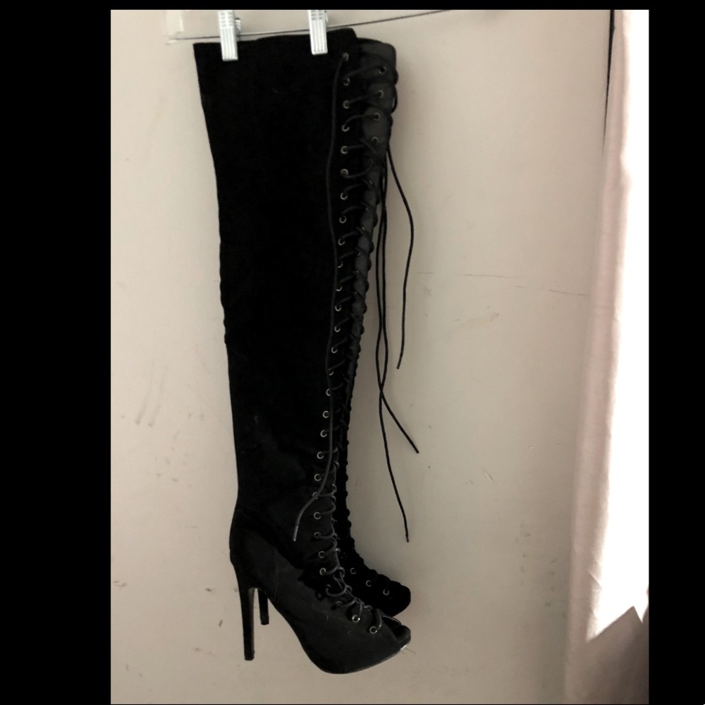 Laced up thigh high heels